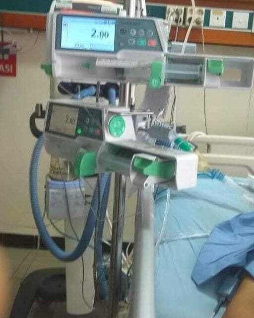 Syringe pumps and ventilator support at an intensive care bedside in a partner hospital